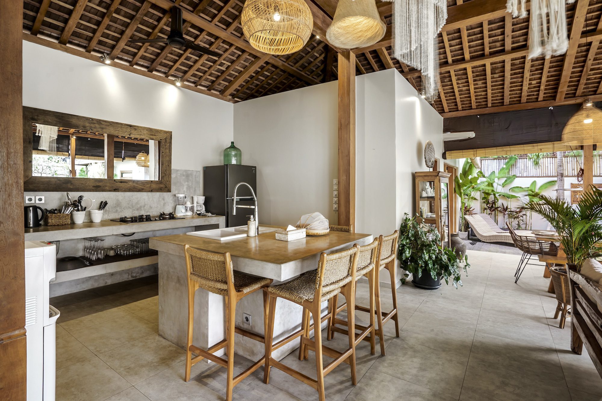 A fully equipped kitchen inside the semi-open living area