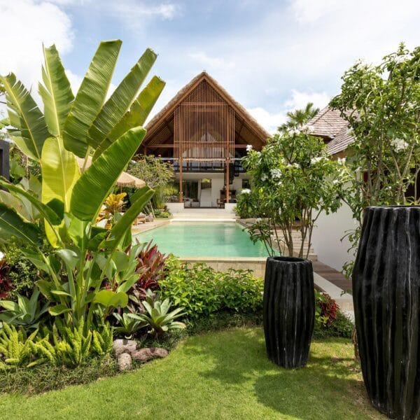 Vilal Chempaka in Canggu with a private pool that is surrounded by lush greenery