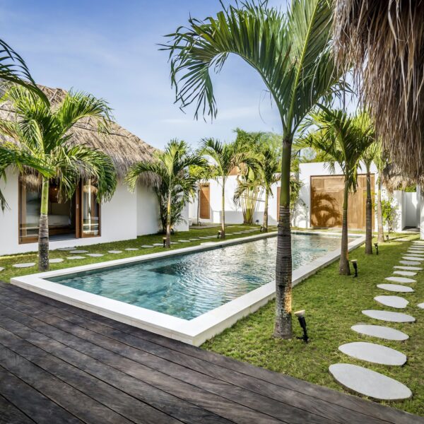 Garden area of Cocotier Seminyak villa with private pool