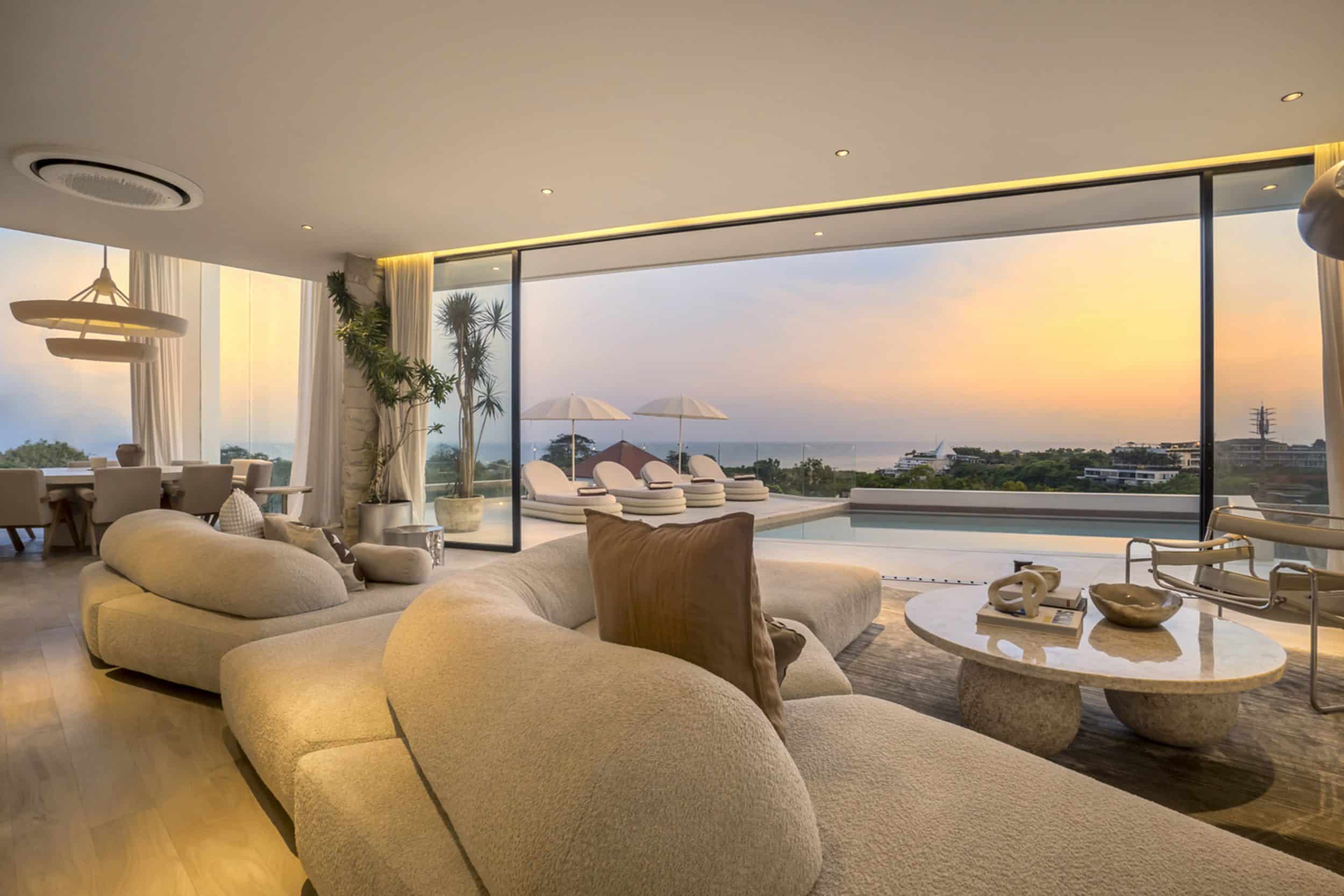 Lounge area overlooking the pool and sunset of this private villa in Bingin