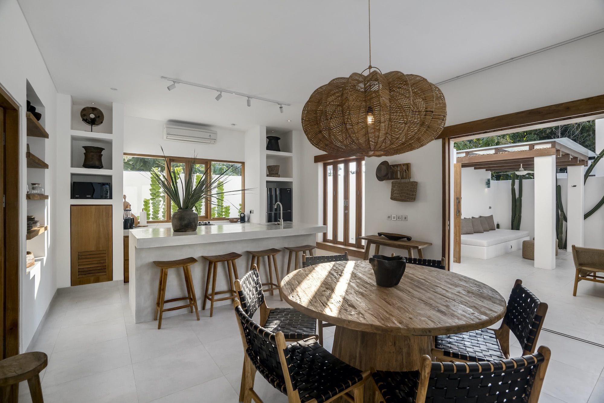 A private villa in Bingin with dining table and an open-kitchen layout