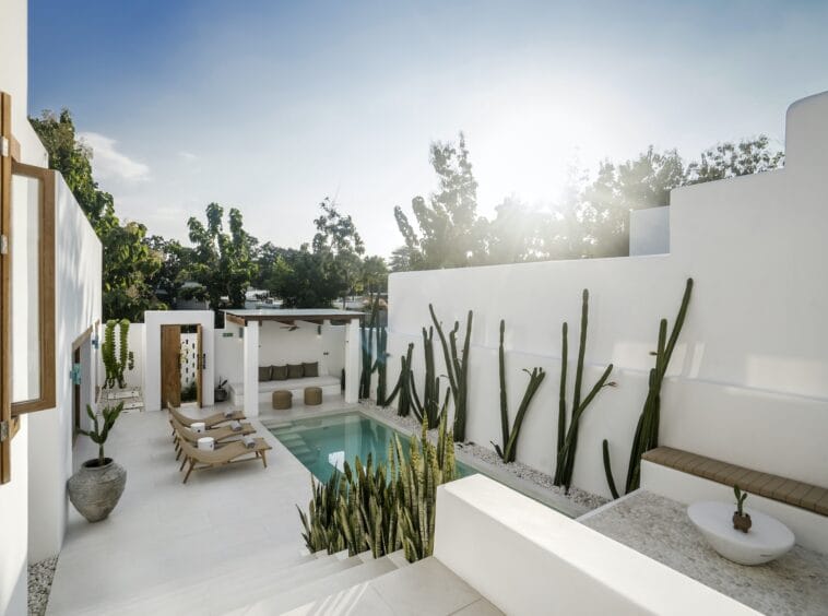 Pool and outside area of a private villa in Bingin seen while the sun is about to go down