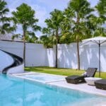 Pool with slide and jet streams in this Villa rental in Berawa