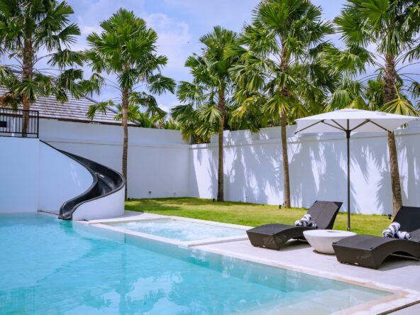 Pool with slide and jet streams in this Villa rental in Berawa