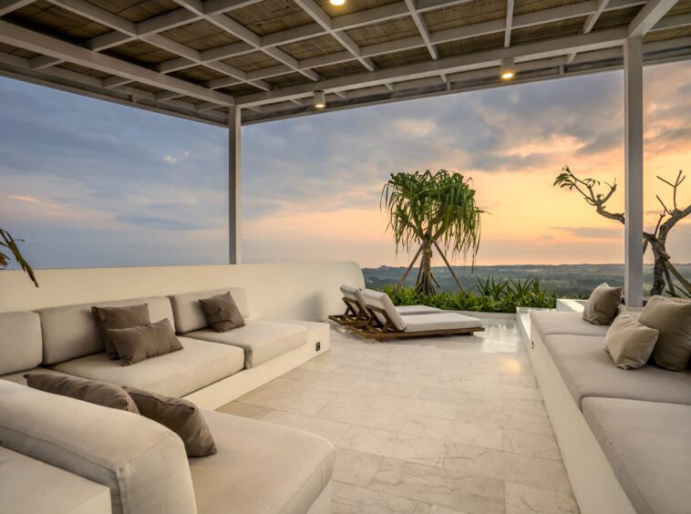 Rooftop with lounge area and sunset view at Uluwatu Villa kalani