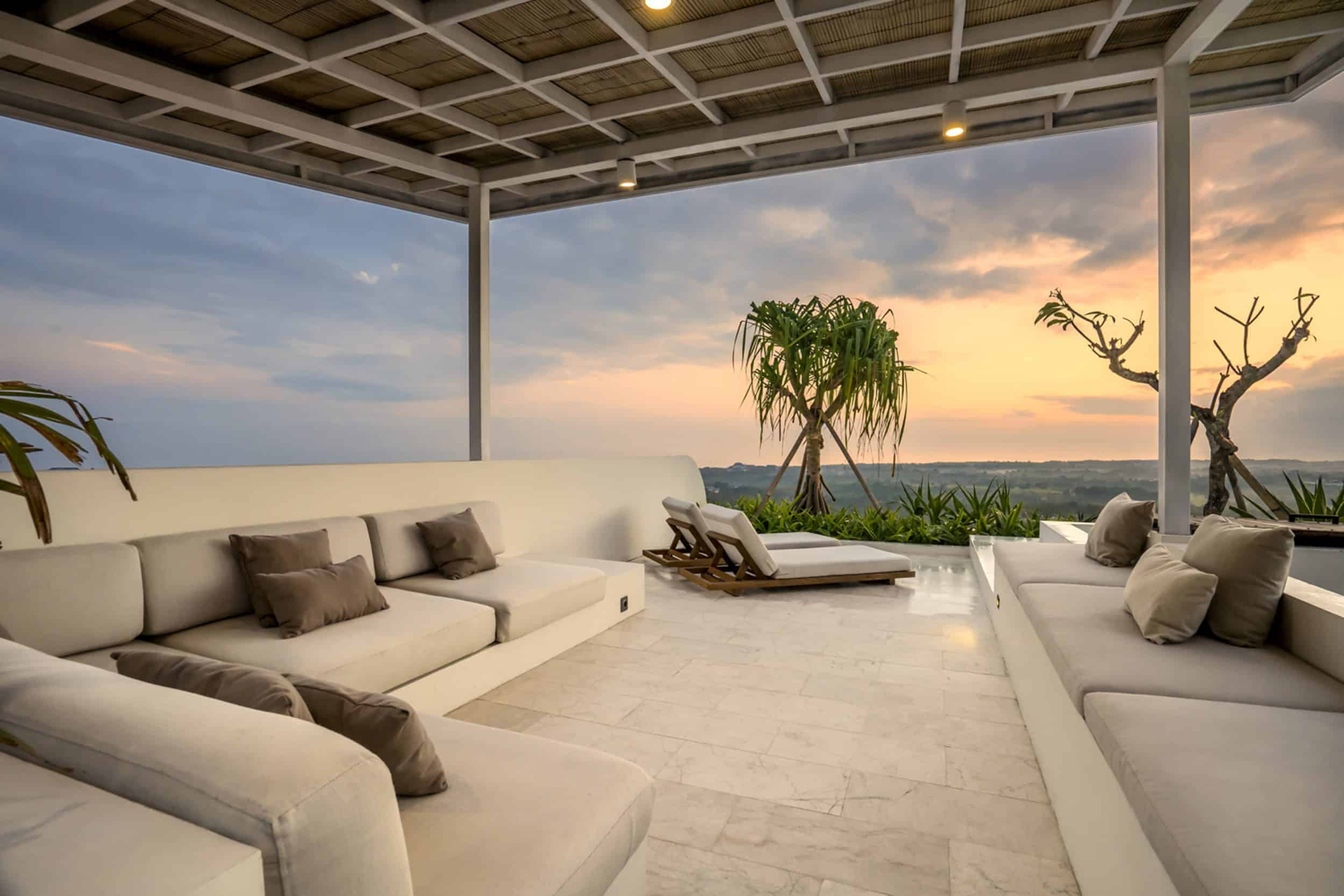 Rooftop with lounge area and sunset view at Uluwatu Villa kalani